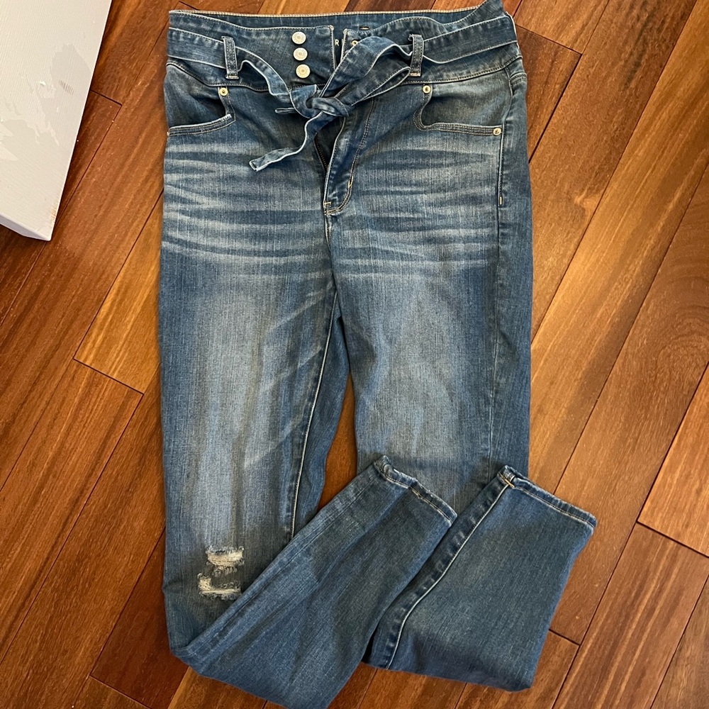 Express high waisted jeans with denim belt